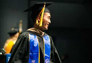 westcliff student in cap and gown at graduation