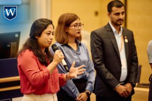 Westcliff Students from King's College Nepal speaking to audience