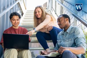 Westcliff University students studying together in the stairwell