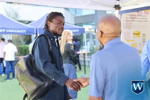 Westcliff University Career Fair 2024, students eagerly interacting with employers