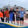 Westcliff University Cross Country Head Coach Abdurrahman Muhammad on track field, marking the program's 2025 return; MBA alumnus and student mentor leading athletic and academic excellence.